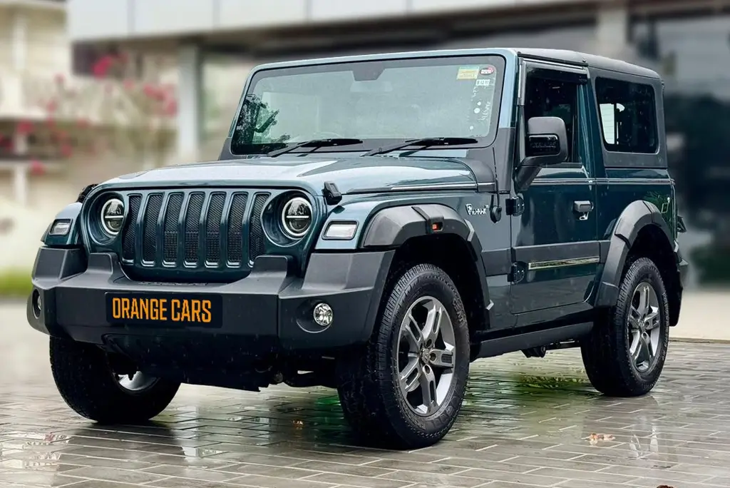 Side profile of a Mahindra Thar available for event rentals at Orange Cars Kollam.